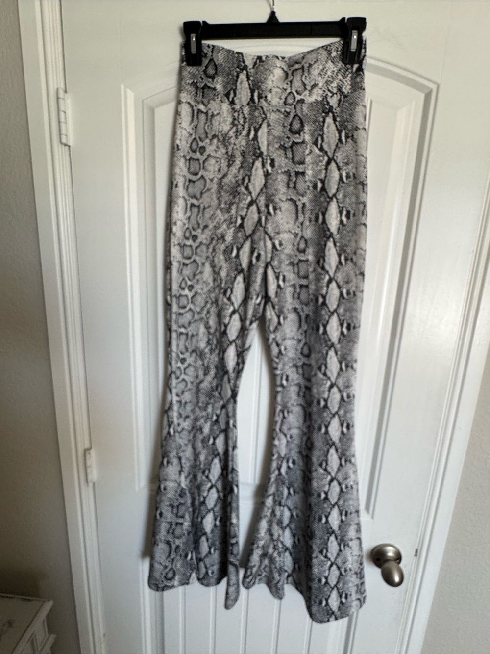 Turquoise Haven- Snake Print Flared Pants